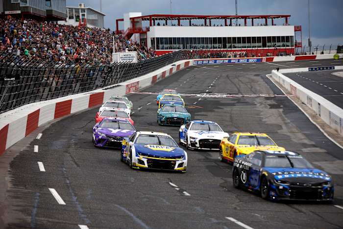 Daniel Suarez, Chase Elliott, Joey Logano and Denny Hamlin race during qualifying heat race #1 for the NASCAR Cup Series All-Star Race at North Wilkesboro Speedway. (Photo by Sean Gardner/Getty Images)